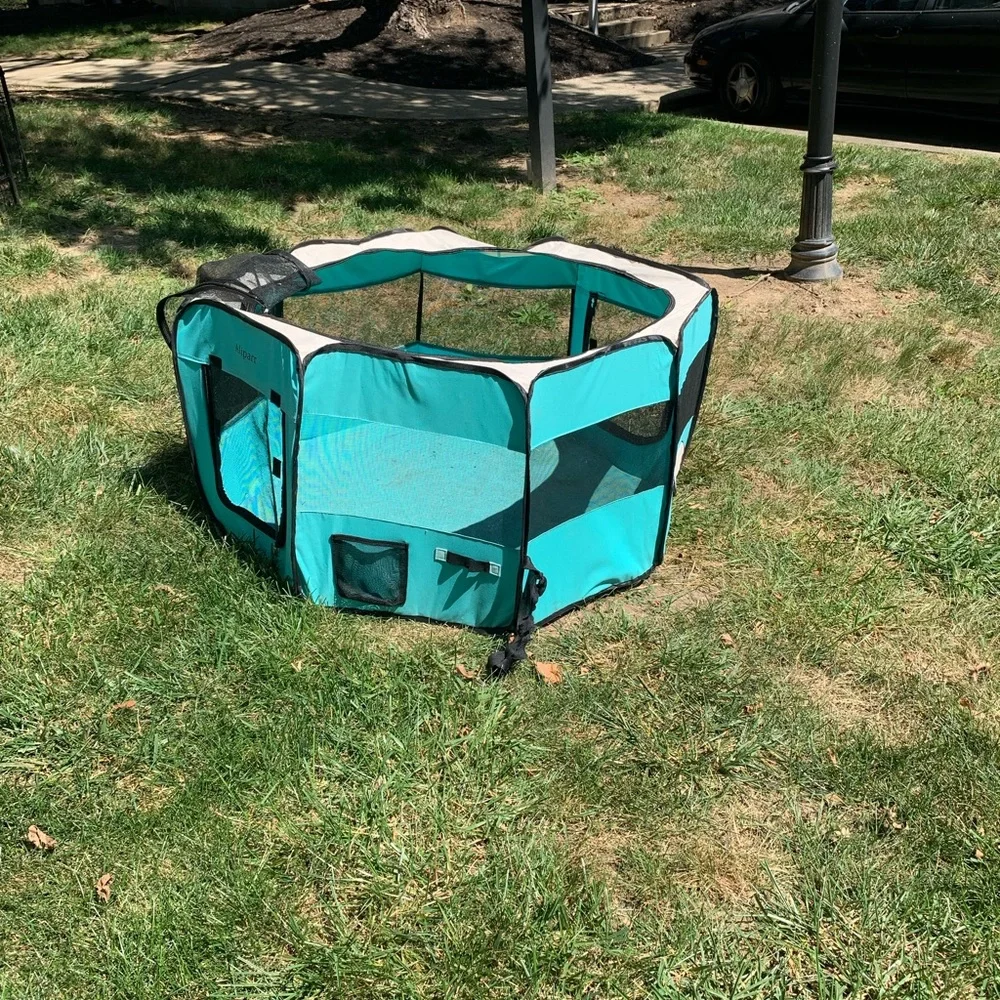 Used Aliparr animal safe zone with zipper top. It had some wear needs cleaned.